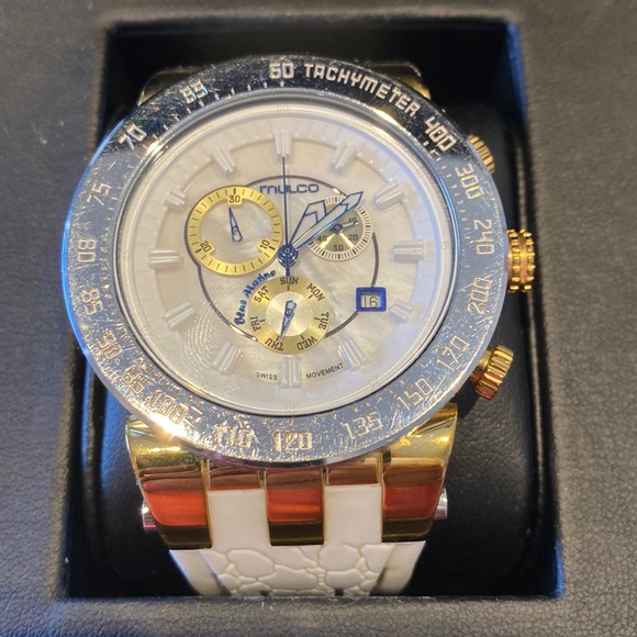 Mulco Jewelry - Mulco Unisex watch.  White band. Gold and silver bessel and trim